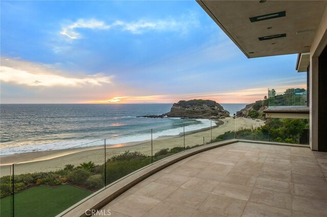 25 Bay Dr, Laguna Beach, CA 92651 - balcony at dusk with a beach view and a water view