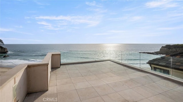 view of patio featuring a water view