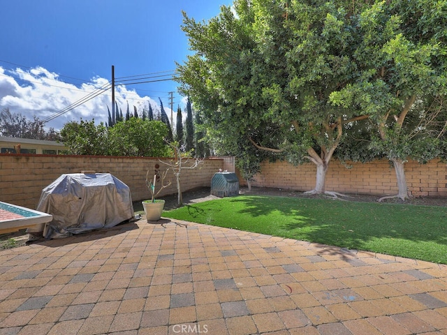 view of patio with a fenced backyard