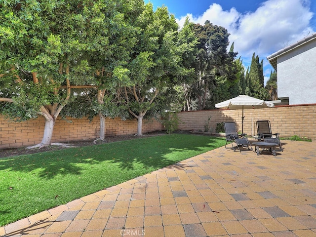 view of patio / terrace with a fenced backyard