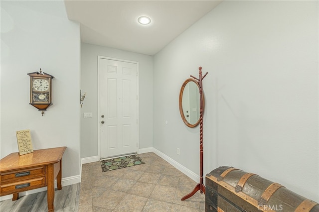 entrance foyer featuring baseboards