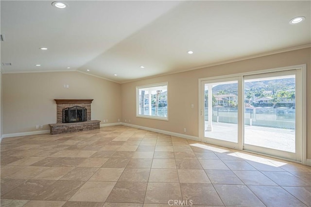 unfurnished living room with recessed lighting, baseboards, crown molding, and lofted ceiling