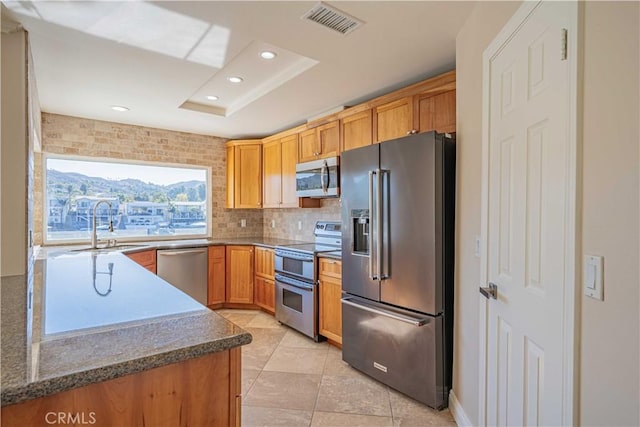 30360 Point Marina Dr, Canyon Lake, CA 92587 - kitchen featuring visible vents, tasteful backsplash, a sink, stainless steel appliances, and recessed lighting