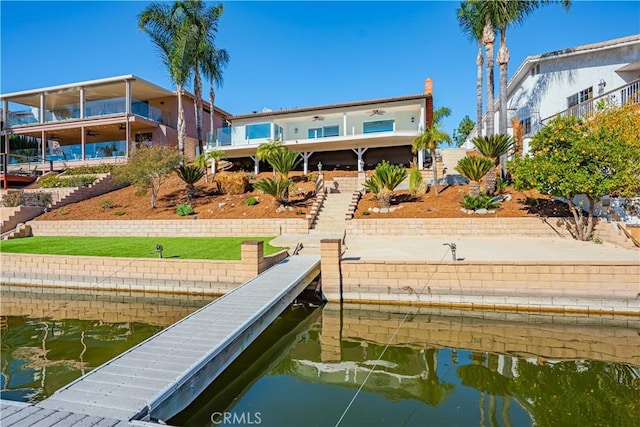 dock area with a water view