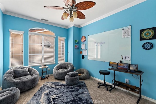 sitting room with visible vents, carpet flooring, crown molding, and baseboards