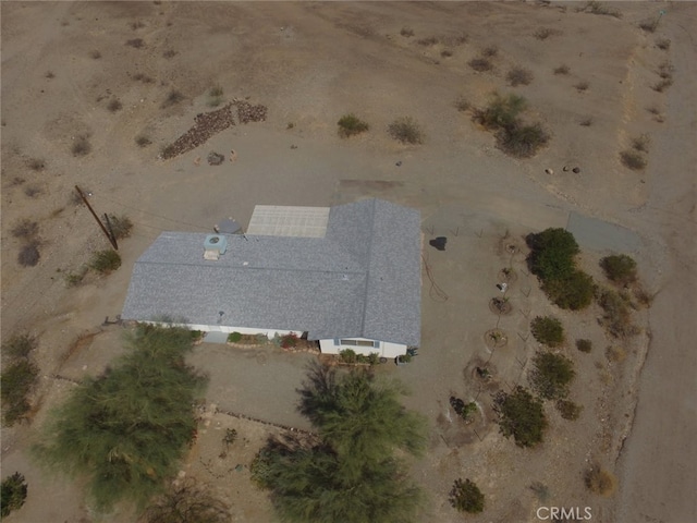 drone / aerial view with a desert view