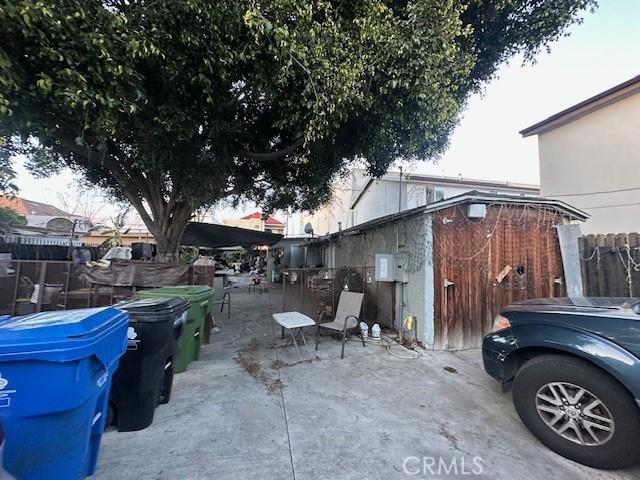 view of side of home with a patio area