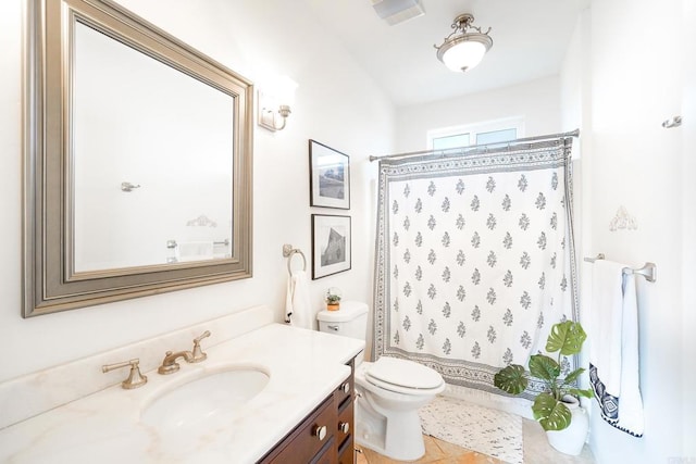 full bathroom with vanity, toilet, and a shower with shower curtain