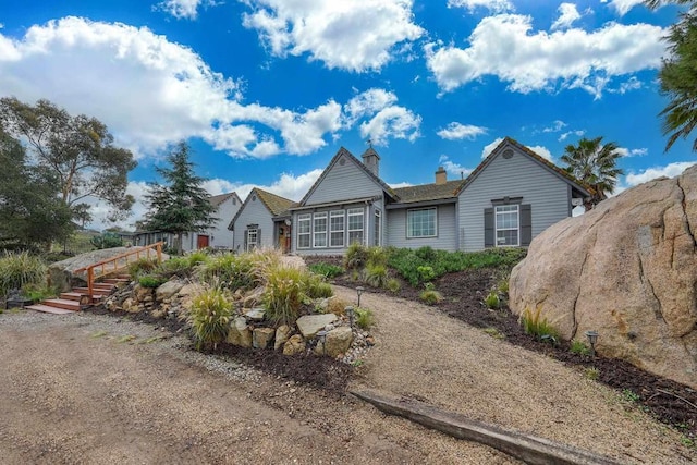 view of front of property featuring a chimney