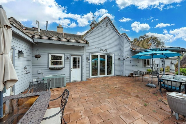 view of patio / terrace with central air condition unit