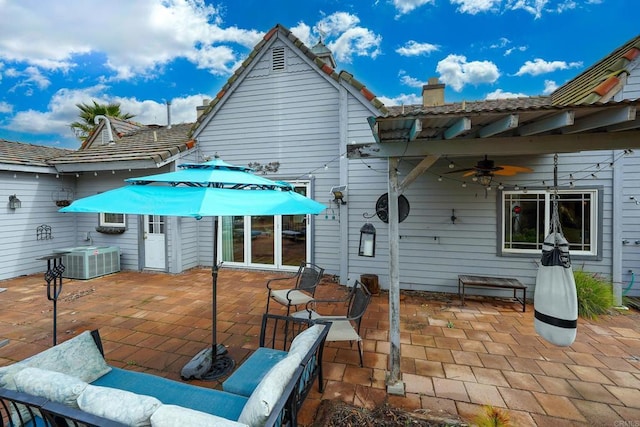 view of patio featuring cooling unit and ceiling fan