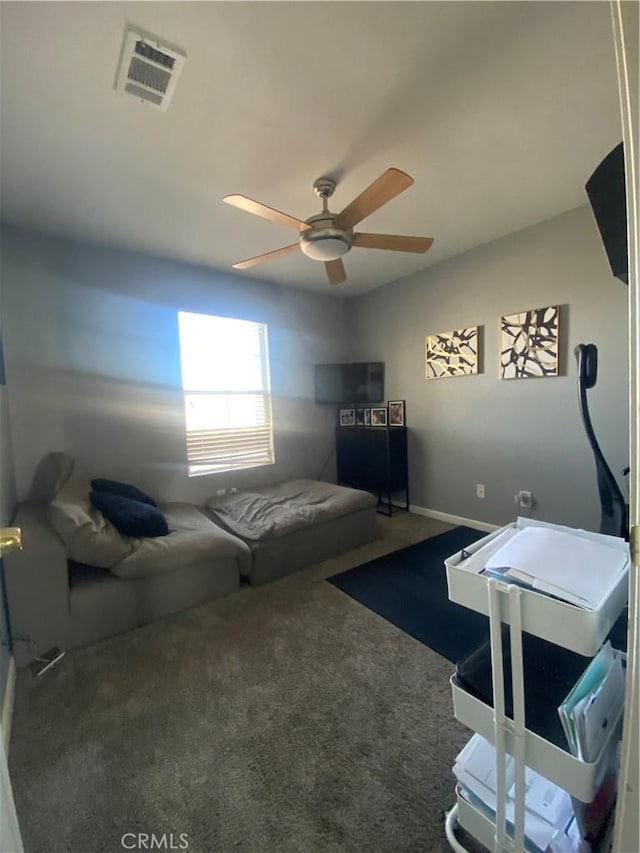 interior space featuring visible vents and a ceiling fan