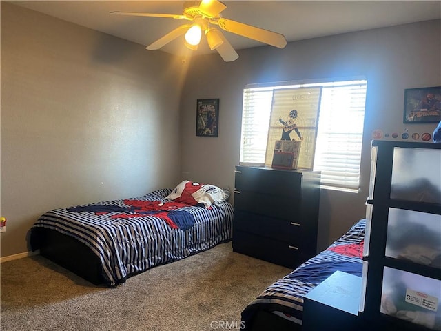 carpeted bedroom featuring ceiling fan