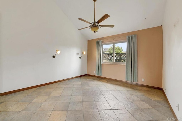 unfurnished room featuring baseboards, high vaulted ceiling, and ceiling fan