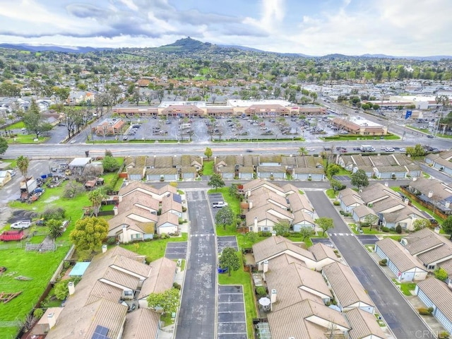 bird's eye view featuring a mountain view and a residential view