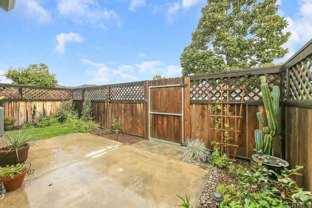 view of patio / terrace with a gate and a fenced backyard