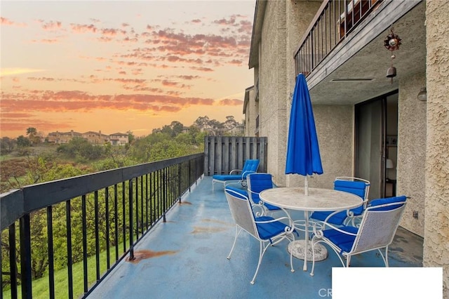 balcony with outdoor dining area