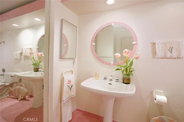 bathroom with recessed lighting