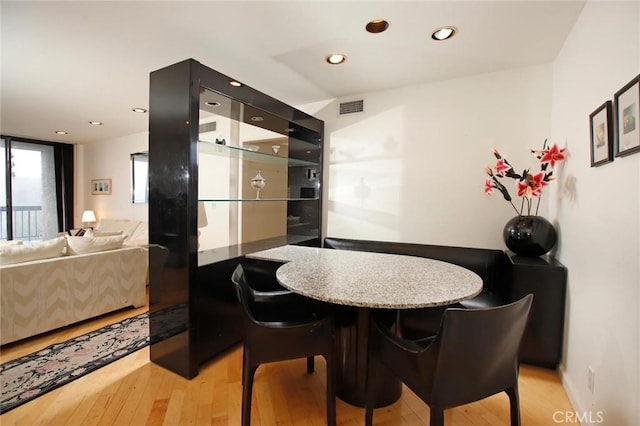 dining room with recessed lighting, visible vents, and light wood-style floors