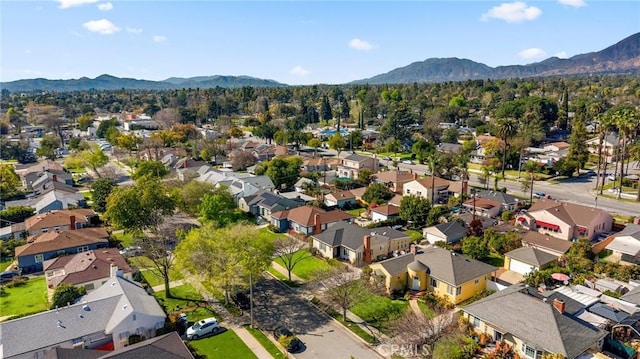 aerial view with a mountain view and a residential view