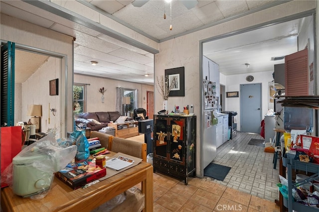 dining space featuring a ceiling fan