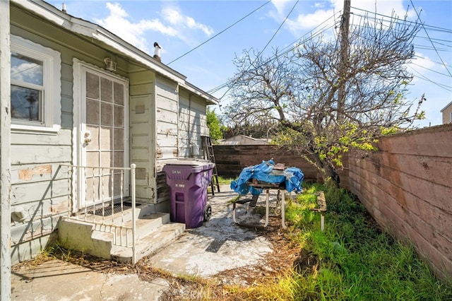 view of patio with fence