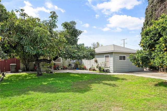 view of yard with a patio and fence