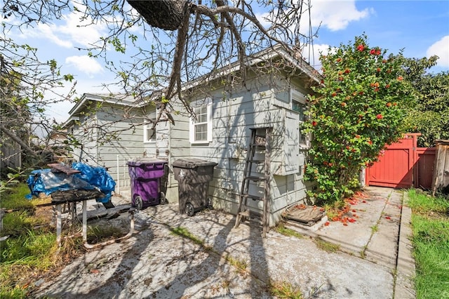 exterior space featuring a gate and fence