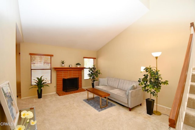 living room with baseboards, carpet floors, high vaulted ceiling, a fireplace, and stairs