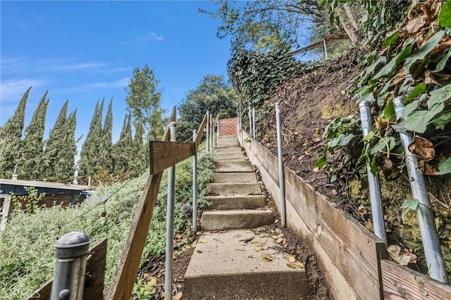 view of home's community featuring stairs