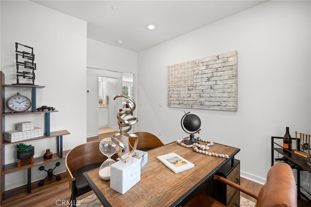 office space with recessed lighting, baseboards, and wood finished floors