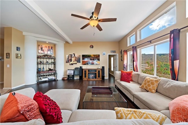 living room with a ceiling fan, wood finished floors, and baseboards