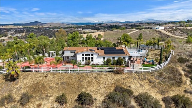 drone / aerial view featuring a mountain view