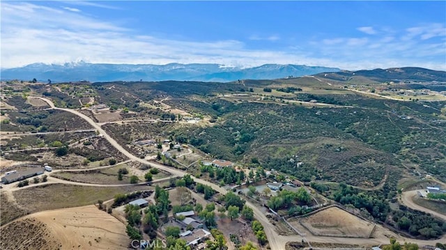 drone / aerial view featuring a mountain view