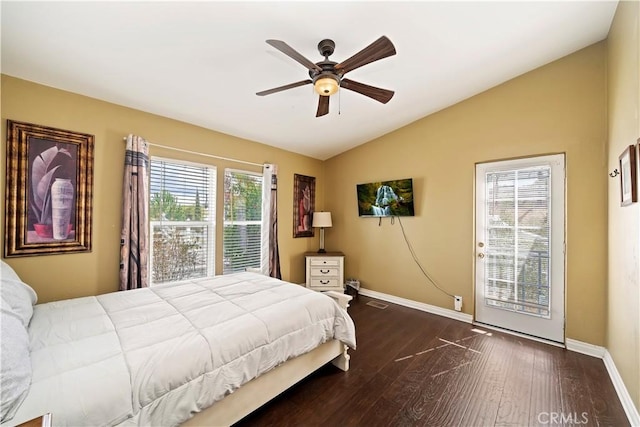 bedroom with baseboards, a ceiling fan, lofted ceiling, and dark wood-style flooring