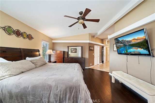 bedroom with a ceiling fan, lofted ceiling, and wood finished floors