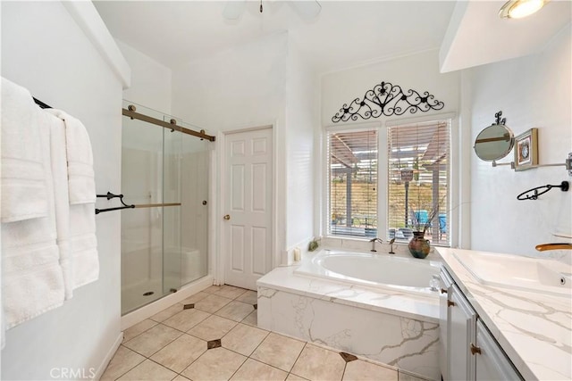 full bathroom with tile patterned floors, a stall shower, vanity, and a bath