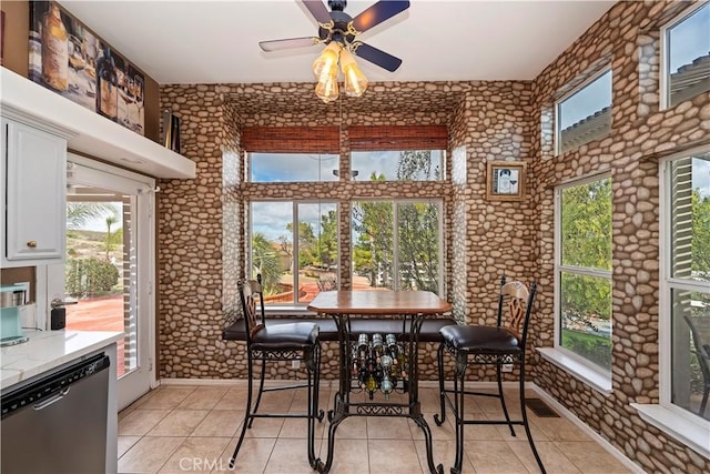 interior space featuring a ceiling fan