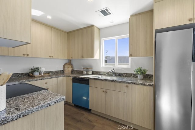 11541 Basye St, El Monte, CA 91732 - kitchen with visible vents, dishwasher, light brown cabinetry, and freestanding refrigerator