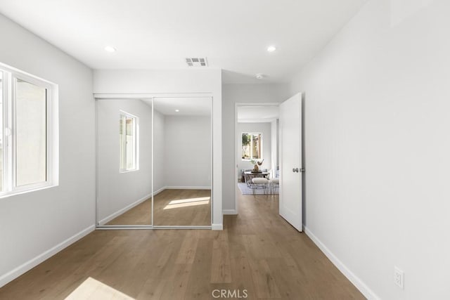 11541 Basye St, El Monte, CA 91732 - unfurnished bedroom featuring light wood-style flooring, recessed lighting, visible vents, and a closet