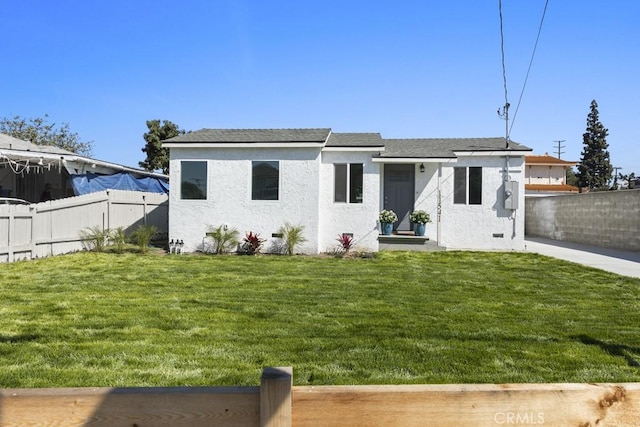 11541 Basye St, El Monte, CA 91732 - back of property with stucco siding, a yard, and fence
