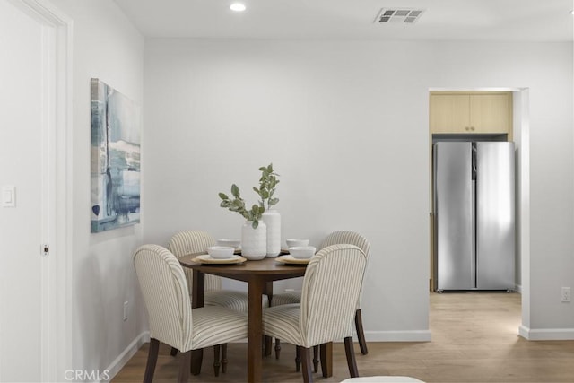 11541 Basye St, El Monte, CA 91732 - dining space with recessed lighting, light wood-style floors, visible vents, and baseboards