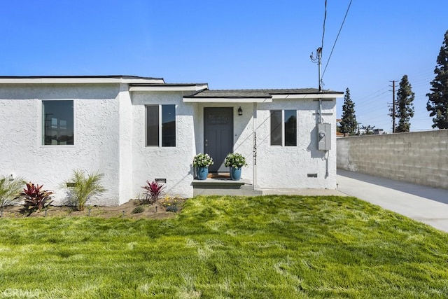 11541 Basye St, El Monte, CA 91732 - view of front of home featuring a front lawn, fence, crawl space, and stucco siding