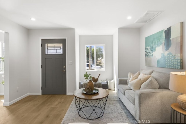 11541 Basye St, El Monte, CA 91732 - living area with recessed lighting, visible vents, light wood finished floors, and baseboards