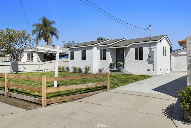 11541 Basye St, El Monte, CA 91732 - view of front of house with a front lawn, a fenced front yard, a garage, and driveway