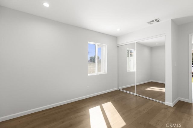 11541 Basye St, El Monte, CA 91732 - unfurnished bedroom with wood finished floors, visible vents, baseboards, recessed lighting, and a closet