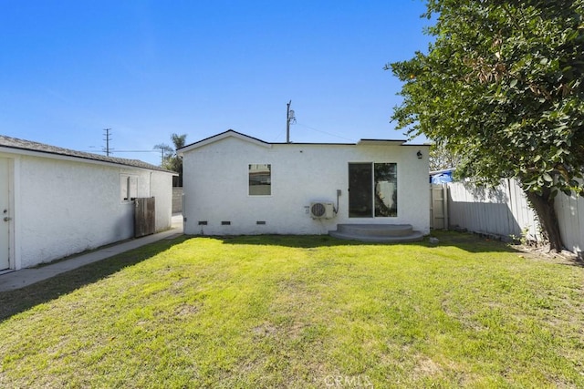 11541 Basye St, El Monte, CA 91732 - back of house featuring a yard, fence, and stucco siding