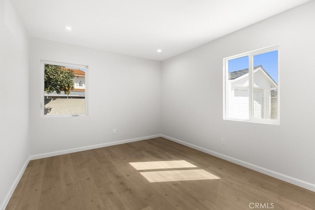 11541 Basye St, El Monte, CA 91732 - empty room featuring recessed lighting, wood finished floors, and baseboards