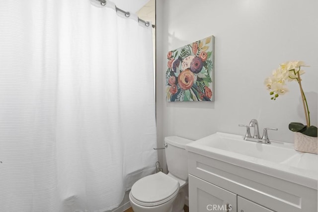 11541 Basye St, El Monte, CA 91732 - bathroom with shower / bath combination with curtain, toilet, and vanity
