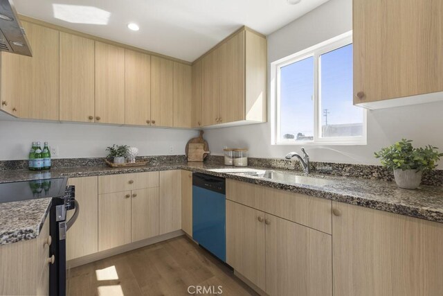 11541 Basye St, El Monte, CA 91732 - kitchen with light brown cabinets, a sink, dark stone counters, light wood-style floors, and dishwasher